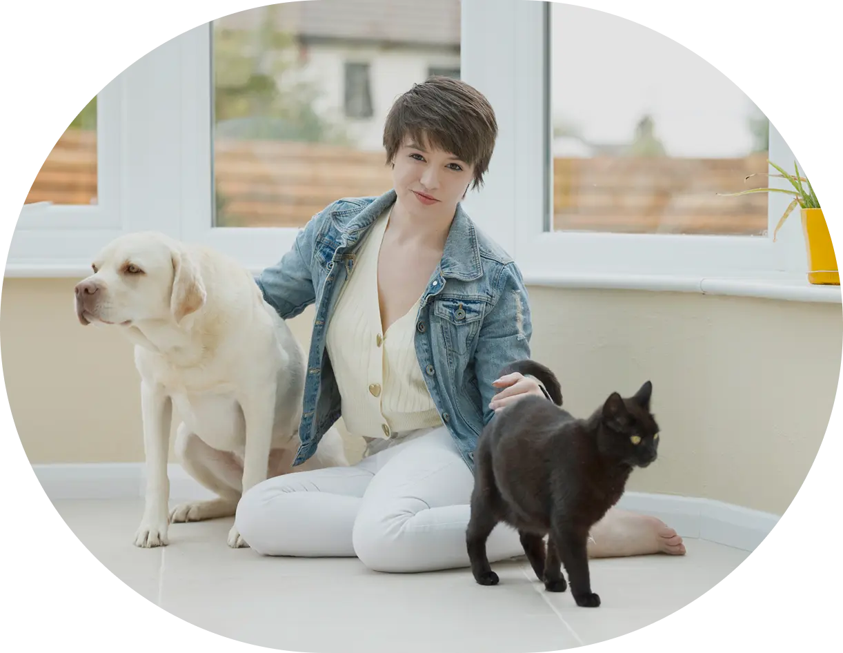 Person with a dog and a cat.